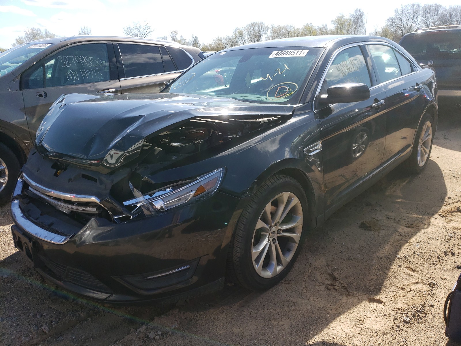 Photo 2 from auction – 2013 FORD TAURUS SEL with VIN 1FAHP2H8XDG180501