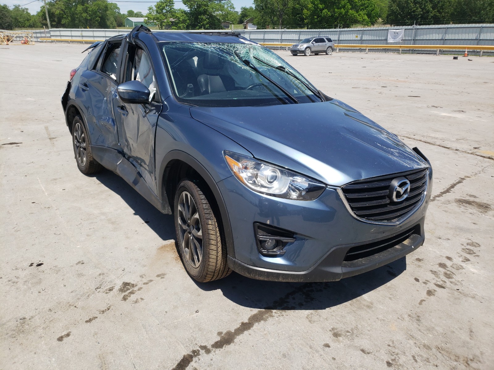 MAZDA CX-5 GT 2016 with VIN JM3KE2DY7G0693527 - Photo from auction