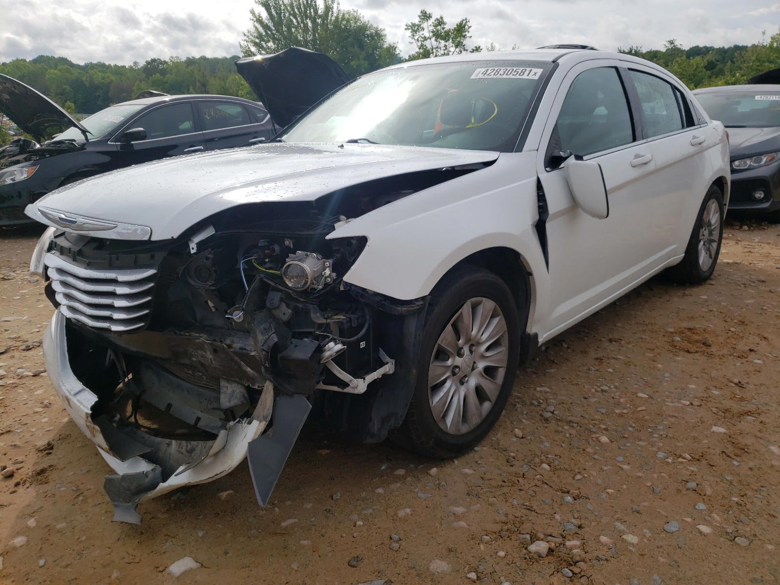 Photo 2 from auction – 2014 CHRYSLER 200 LX with VIN 1C3CCBAB5EN142682