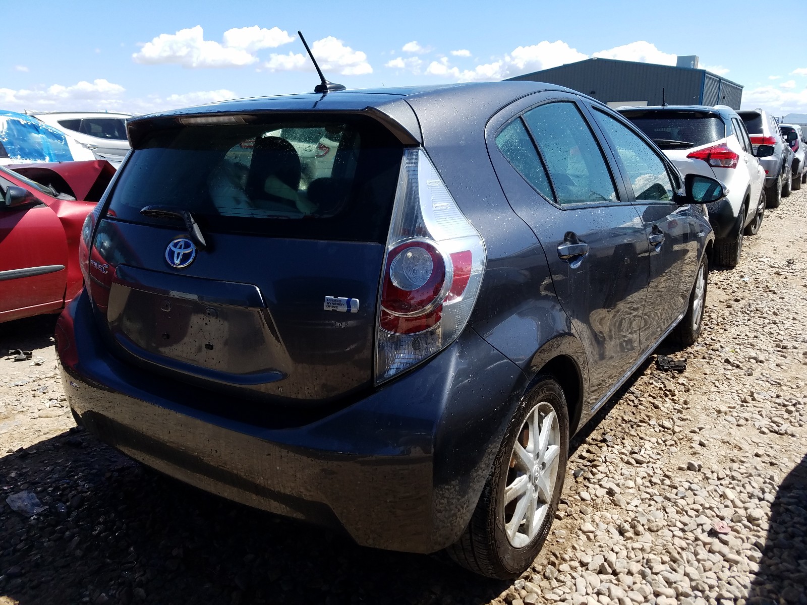 Photo 4 from auction – 2013 TOYOTA PRIUS C with VIN JTDKDTB38D1044964