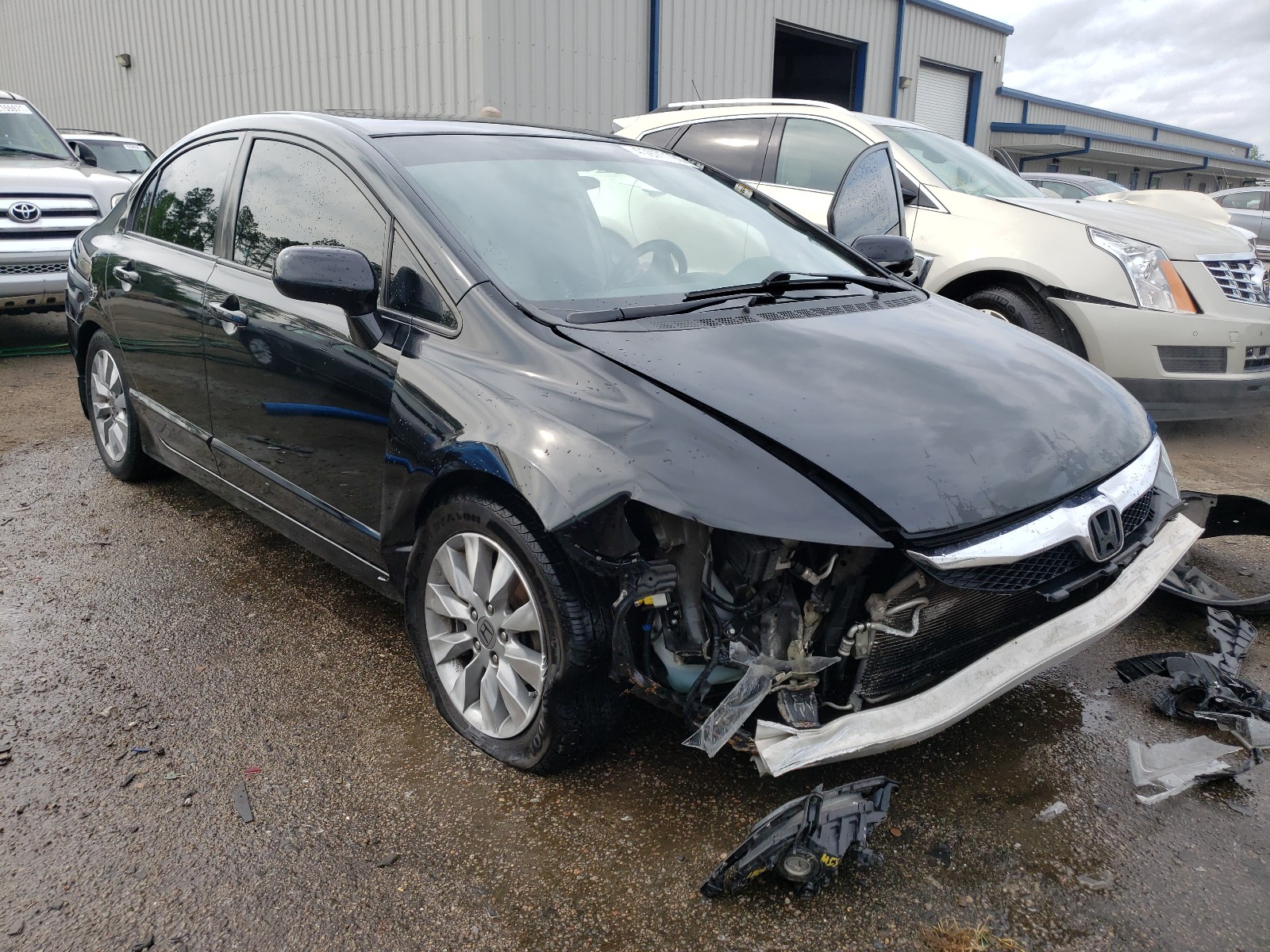 HONDA CIVIC EXL 2011 with VIN 2HGFA1F99BH517509 - Photo from auction