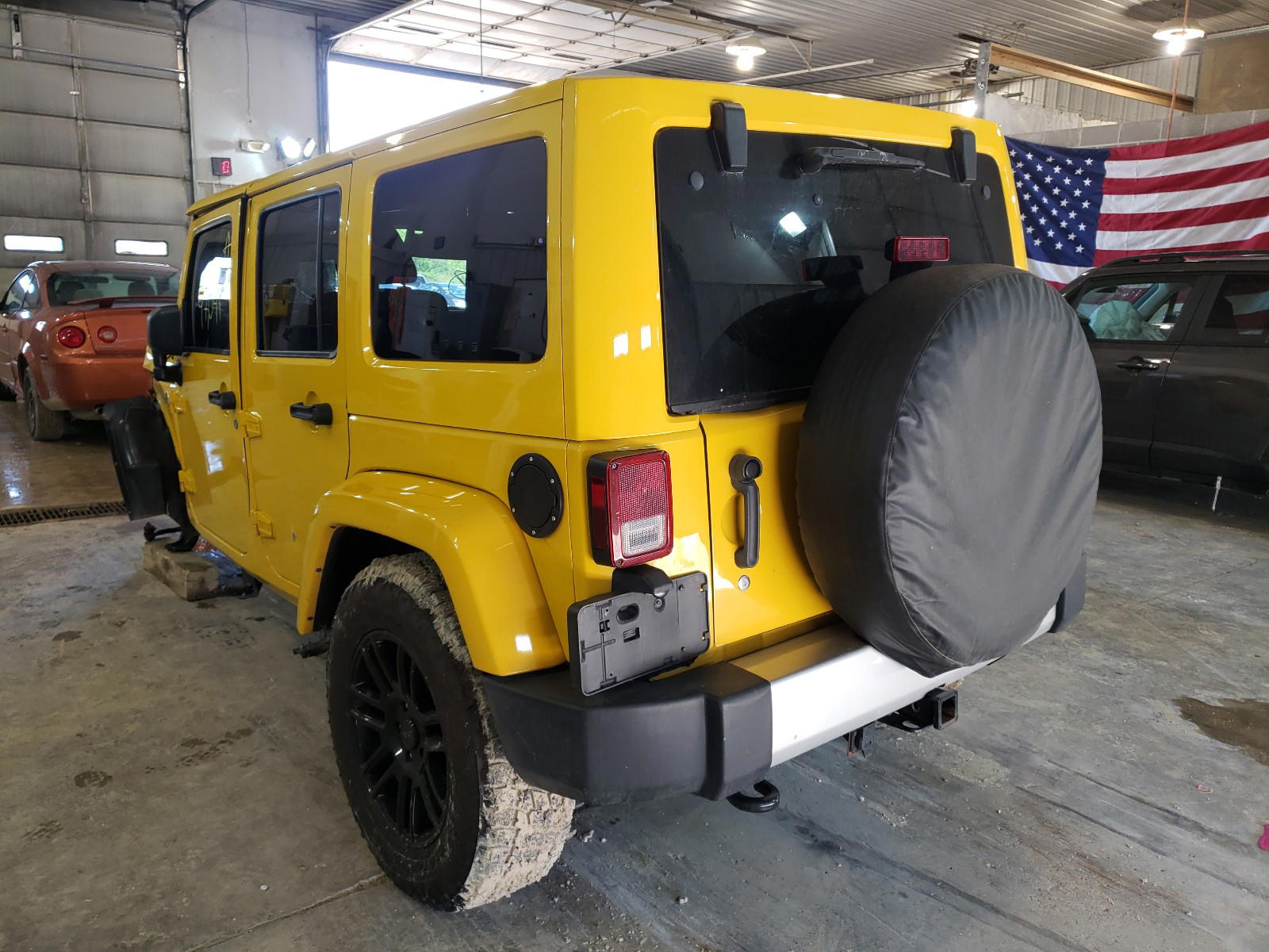 Photo 3 from auction – 2011 JEEP WRANGLER U with VIN 1J4BA5H19BL556738
