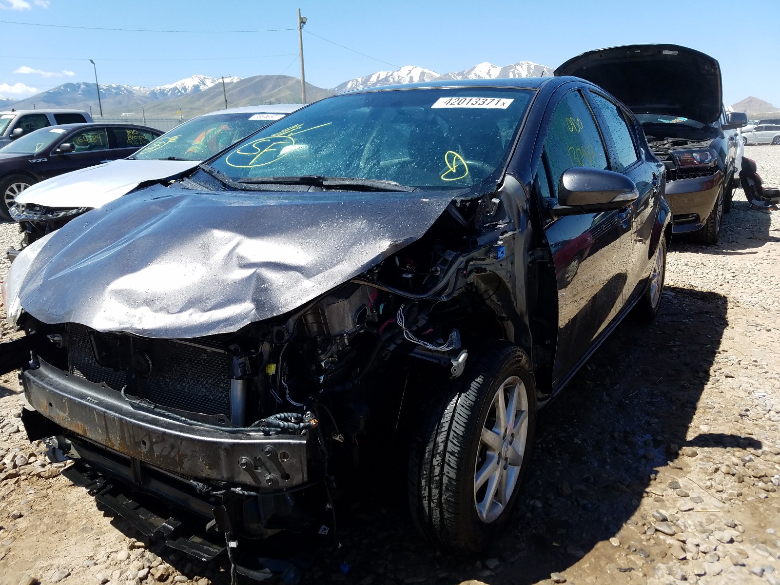 Photo 2 from auction – 2013 TOYOTA PRIUS C with VIN JTDKDTB38D1044964