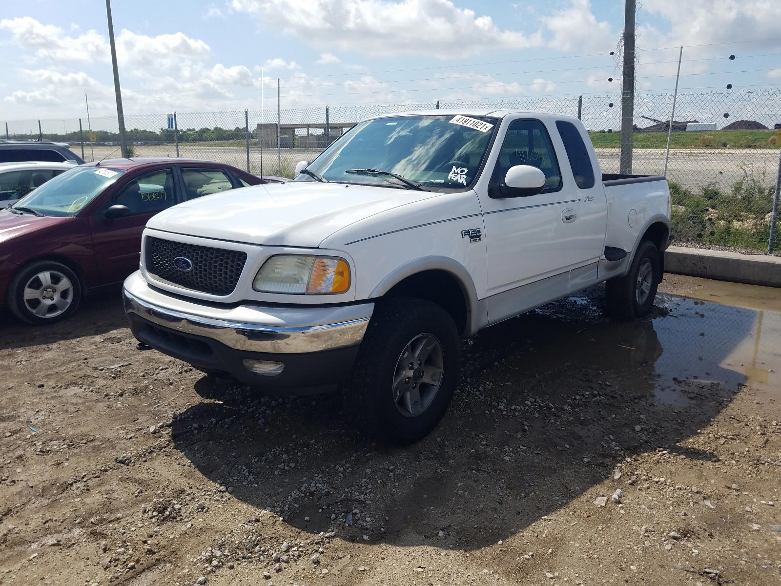 Photo 12 from auction – 2003 FORD F150 with VIN 1FTRX08L53KD30789