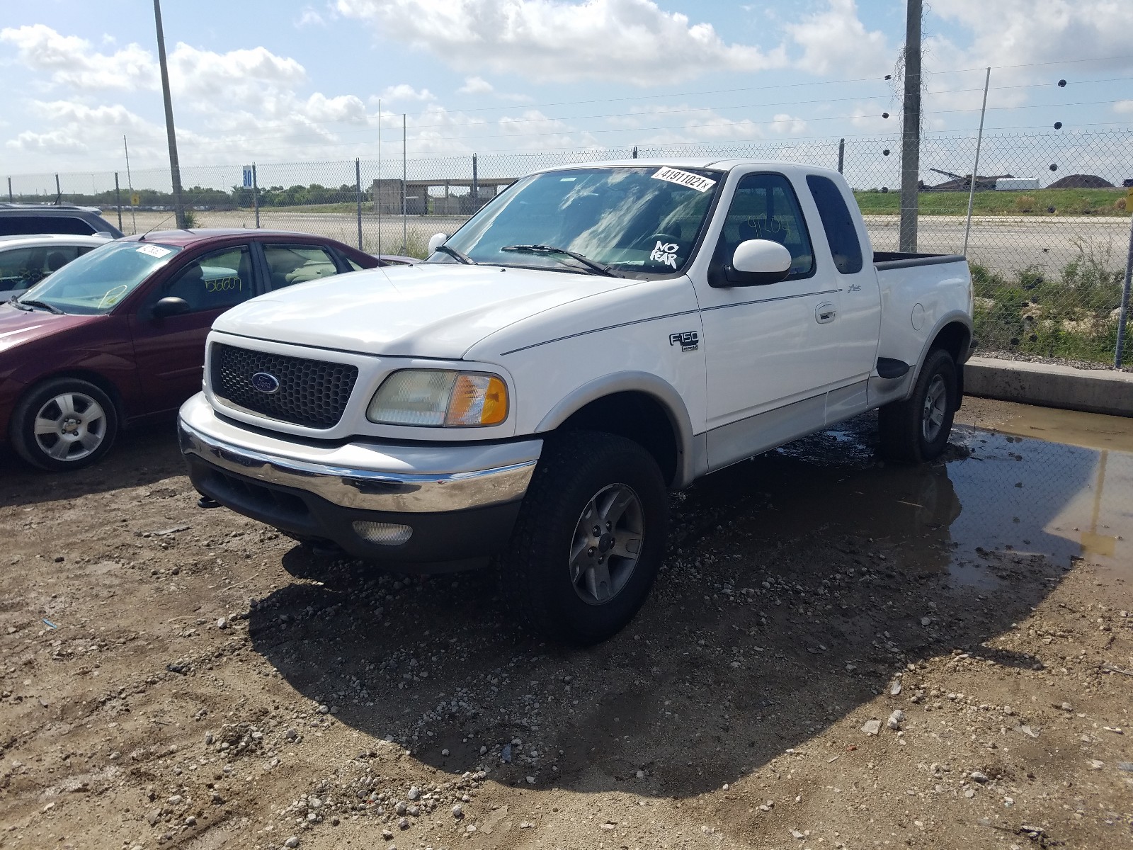 Foto 12 de la subasta – 2003 FORD F150 con VIN 1FTRX08L53KD30789