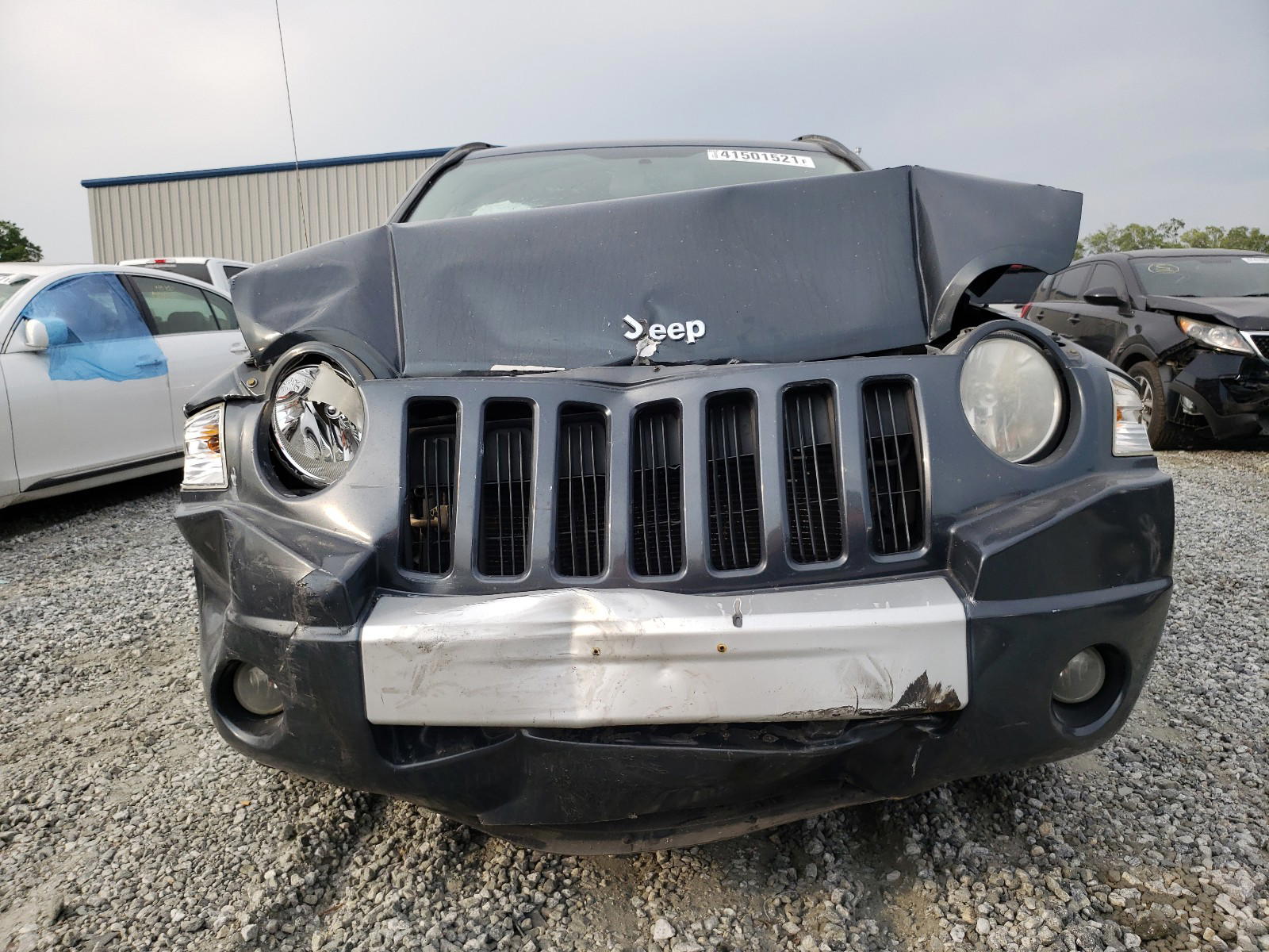 Photo 7 from auction – 2007 JEEP COMPASS LI with VIN 1J8FF57W67D144003
