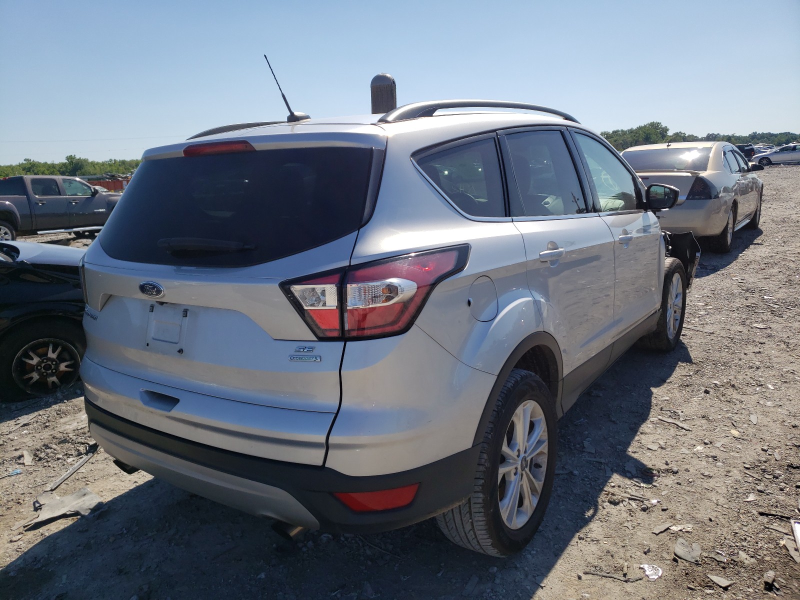 Photo 4 from auction – 2018 FORD ESCAPE SE with VIN 1FMCU0GD4JUB45770