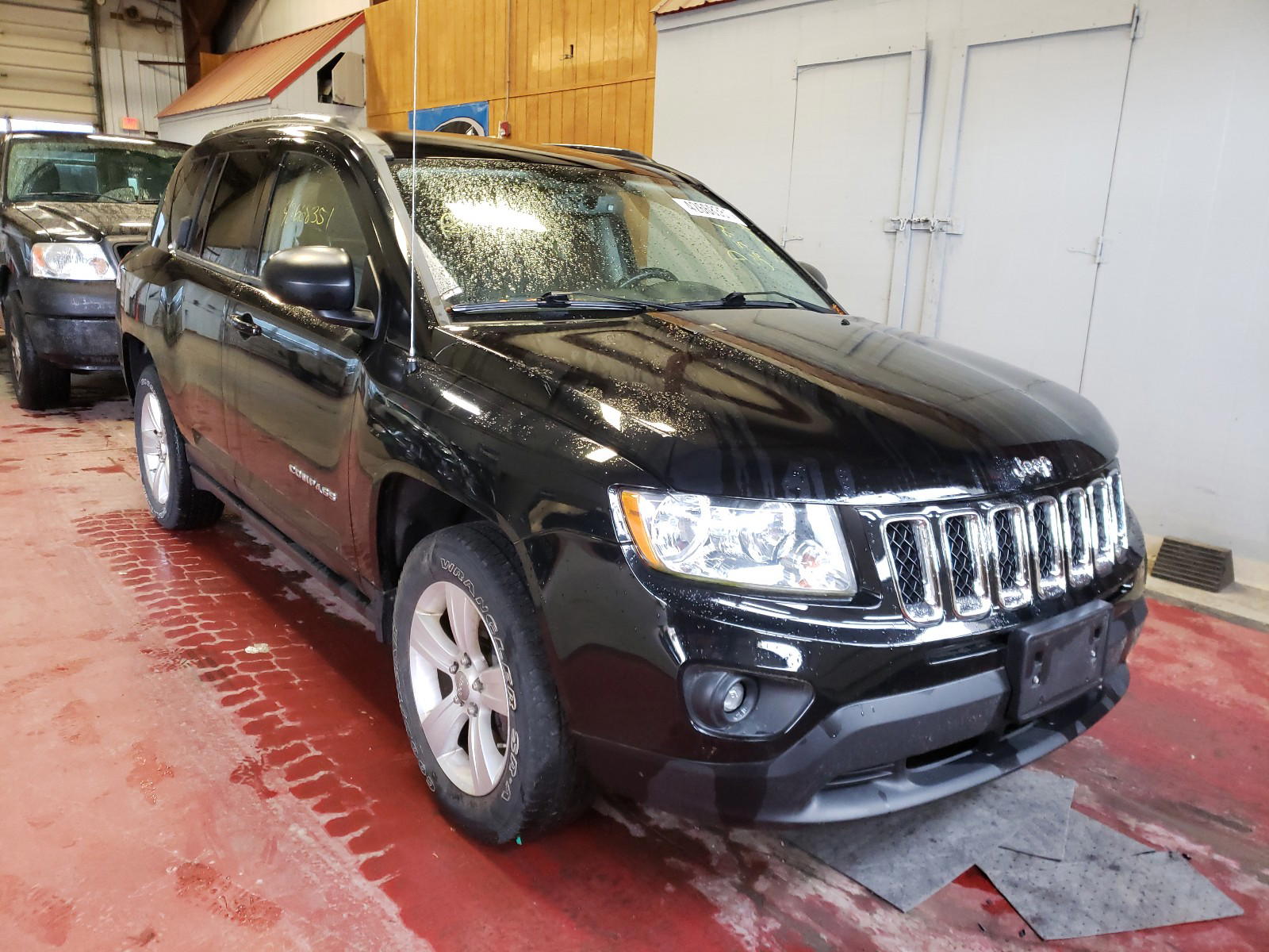 JEEP COMPASS LA 2012 with VIN 1C4NJDEB4CD578779 - Photo from auction