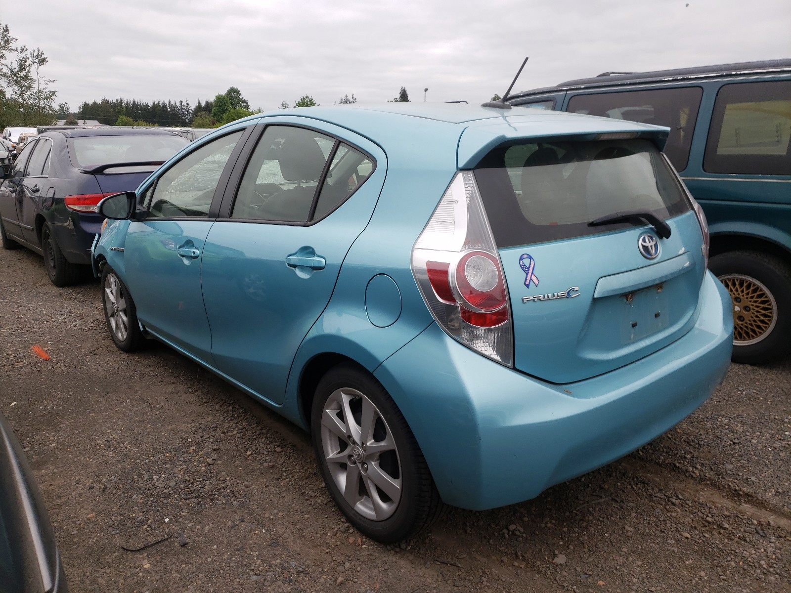 Photo 3 from auction – 2013 TOYOTA PRIUS C with VIN JTDKDTB33D1047920