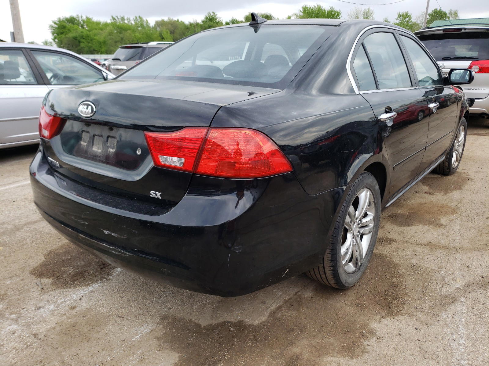 Photo 4 from auction – 2009 KIA OPTIMA SX with VIN KNAGE228895334403