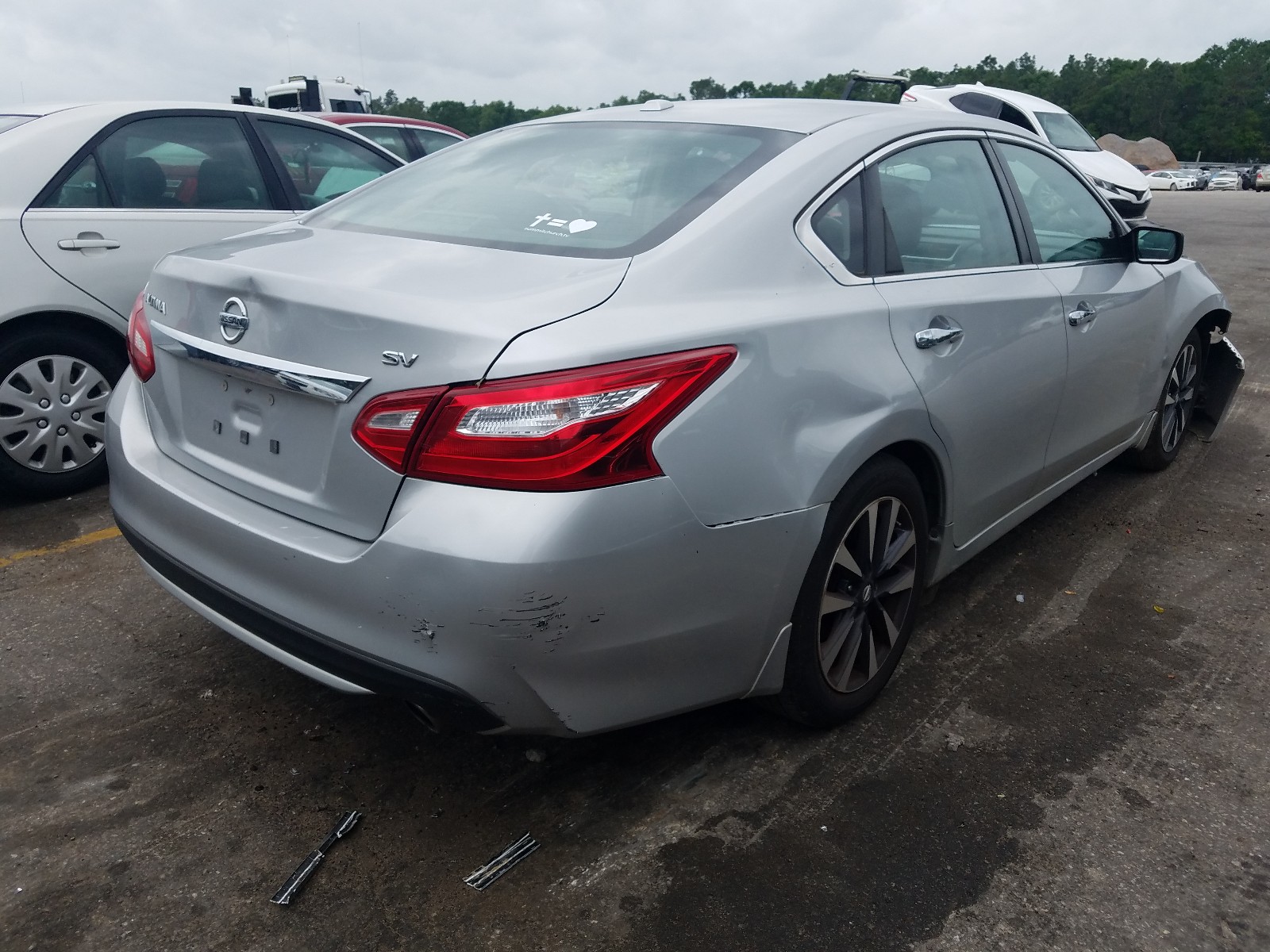Photo 4 from auction – 2016 NISSAN ALTIMA 2.5 with VIN 1N4AL3AP5GC221391
