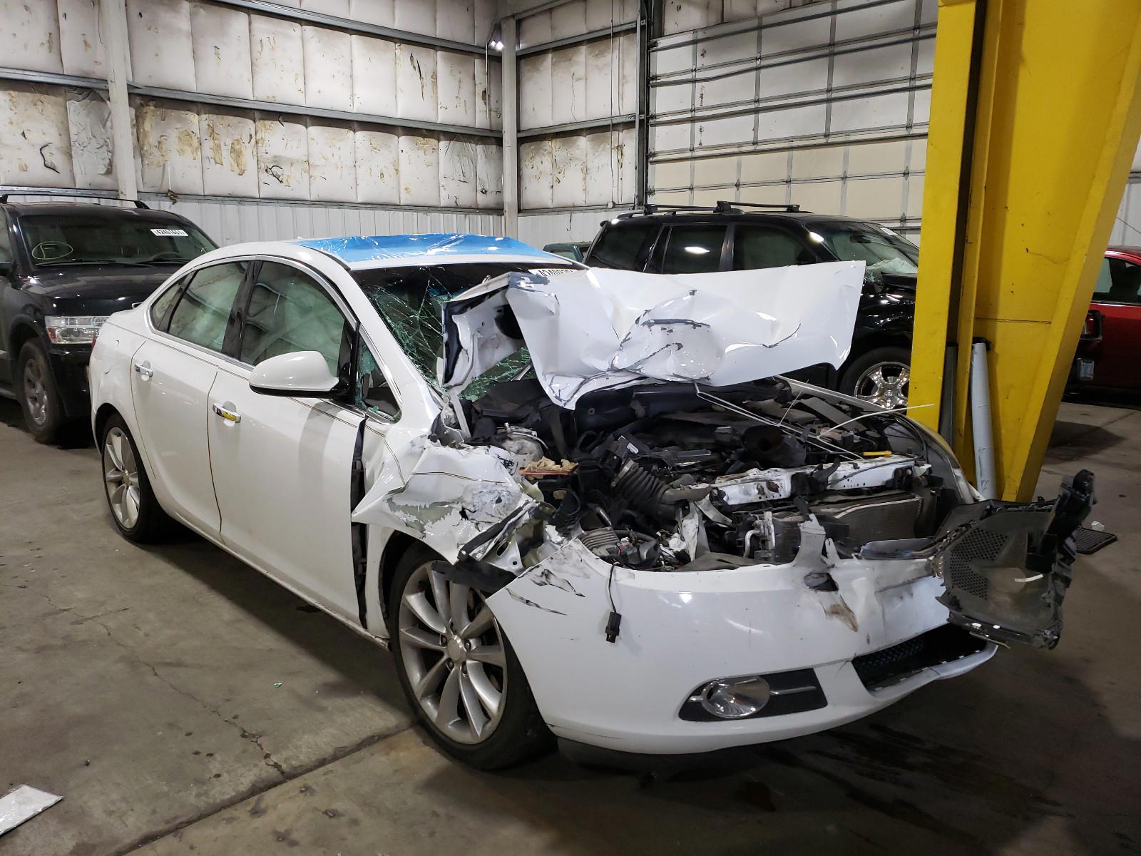 BUICK VERANO 2012 with VIN 1G4PS5SK3C4146602 - Photo from auction