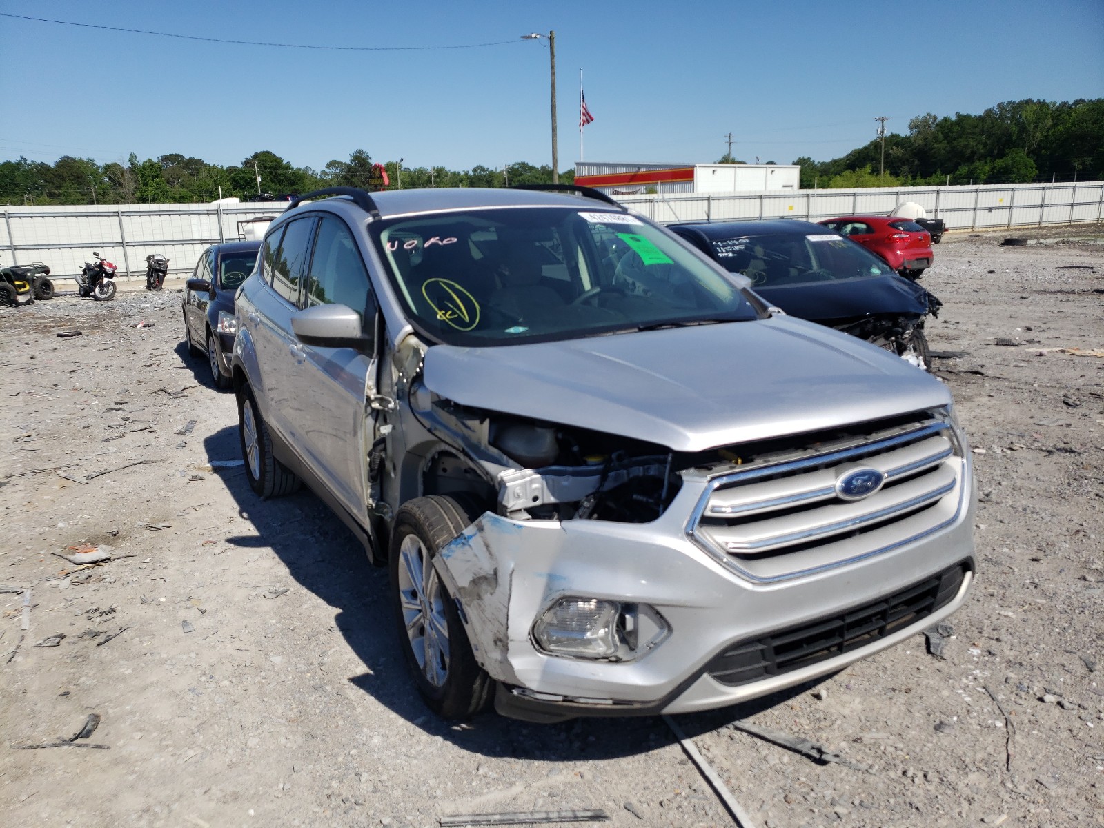 FORD ESCAPE SE 2018 with VIN 1FMCU0GD4JUB45770 - Photo from auction