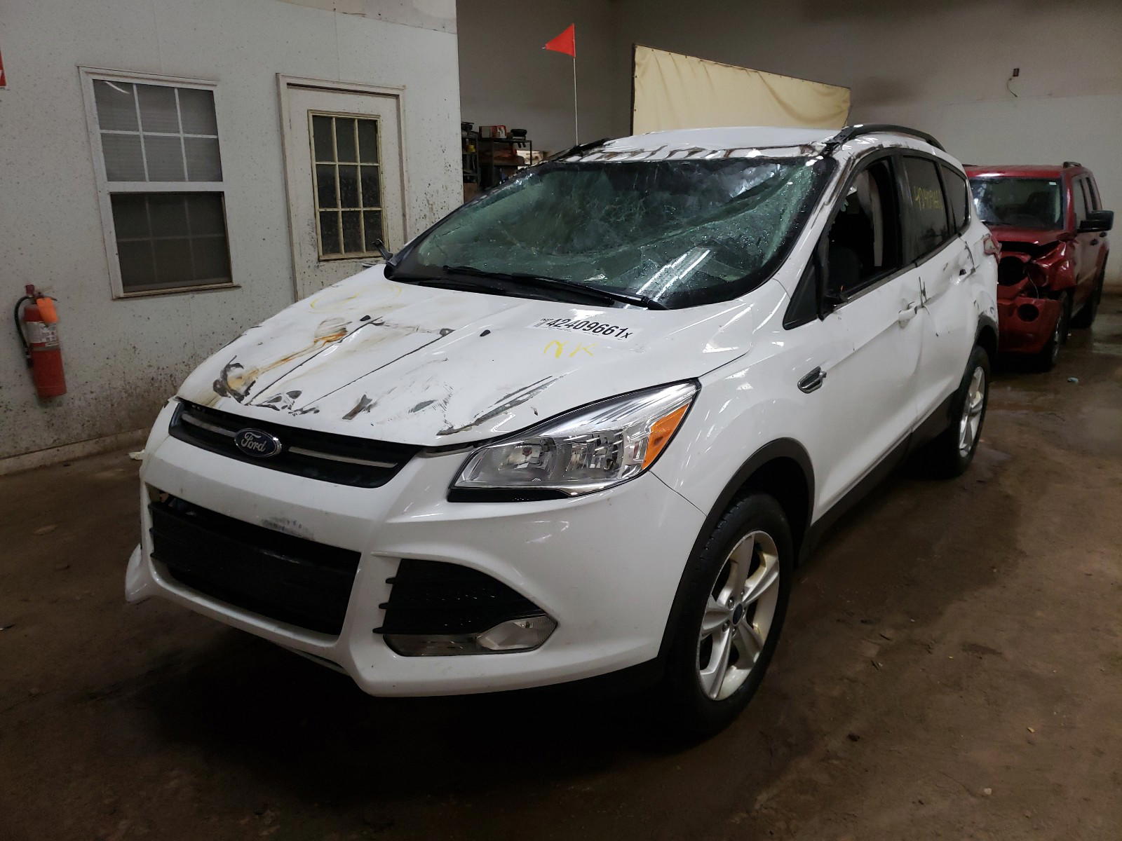 Photo 2 from auction – 2014 FORD ESCAPE SE with VIN 1FMCU9G96EUE50211