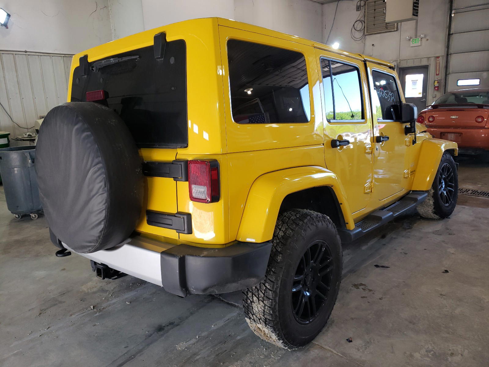 Photo 4 from auction – 2011 JEEP WRANGLER U with VIN 1J4BA5H19BL556738
