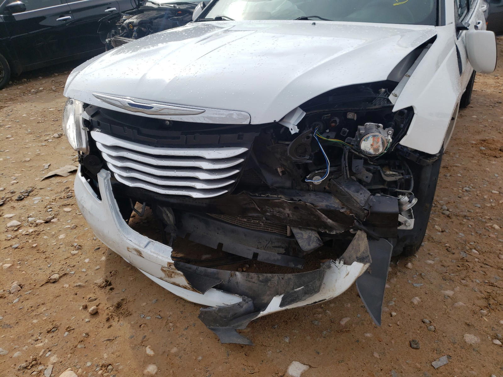 Photo 9 from auction – 2014 CHRYSLER 200 LX with VIN 1C3CCBAB5EN142682