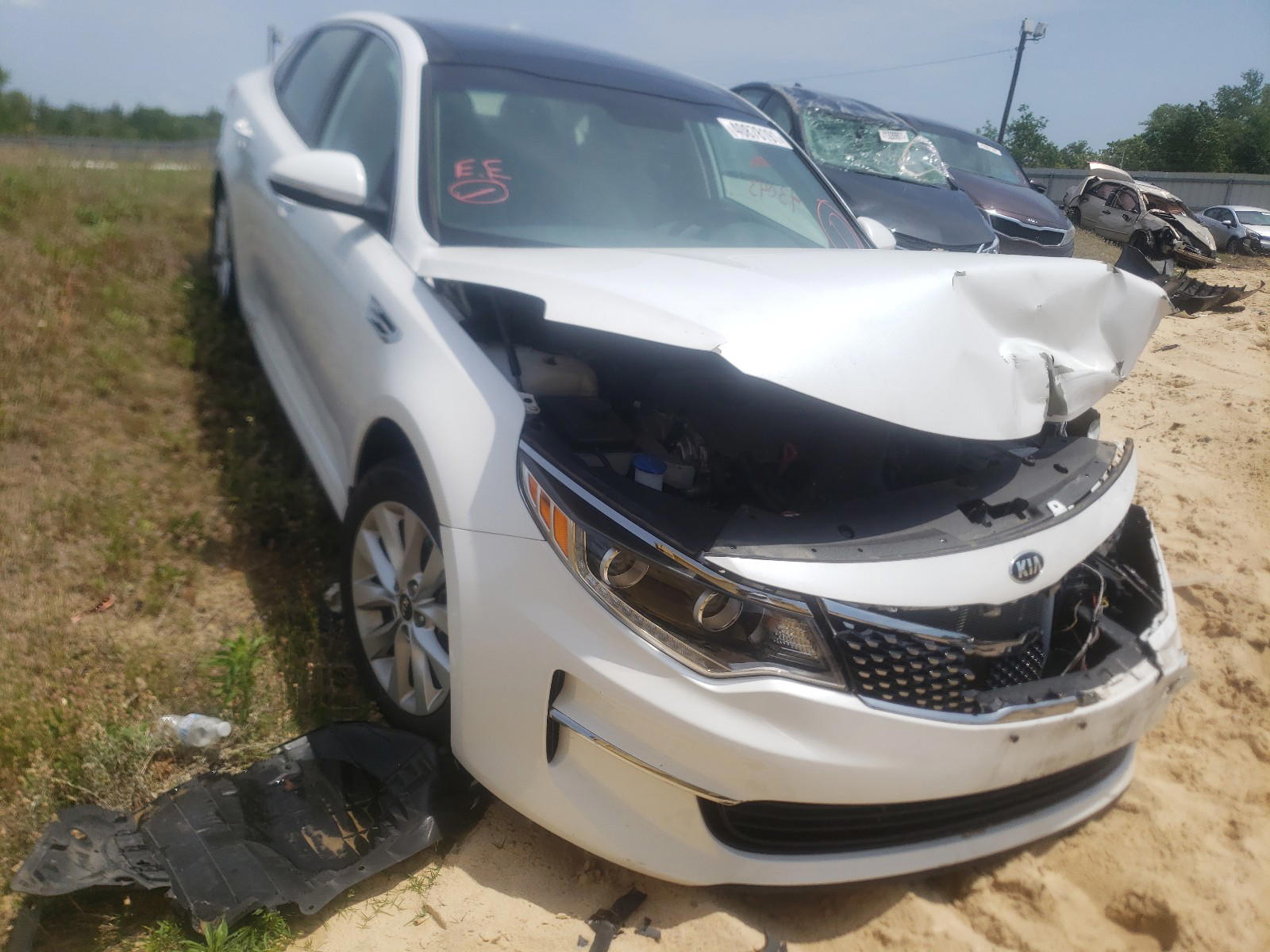 KIA OPTIMA EX 2016 with VIN 5XXGU4L37GG013000 - Photo from auction