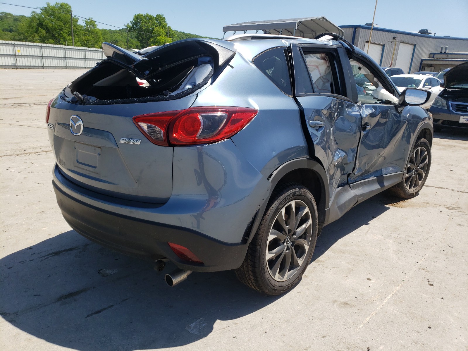 Photo 4 from auction – 2016 MAZDA CX-5 GT with VIN JM3KE2DY7G0693527
