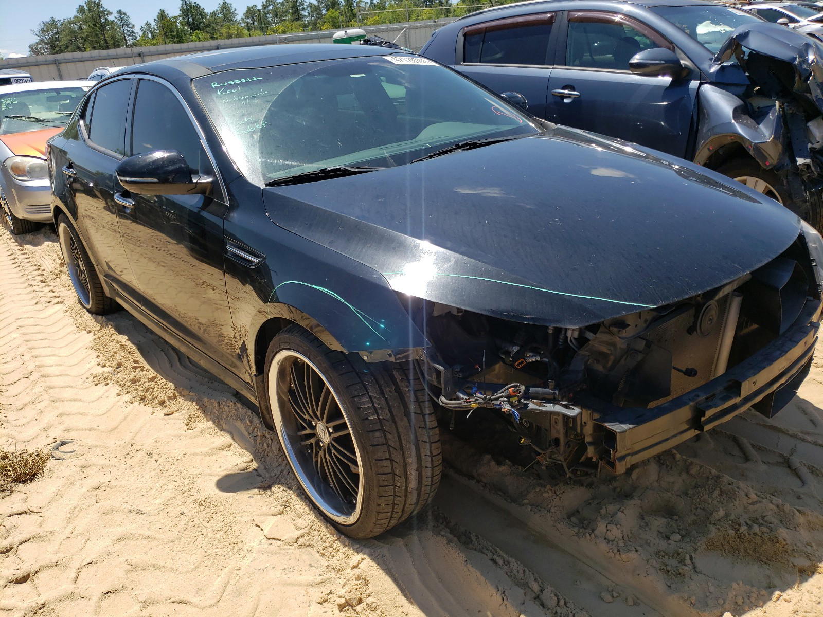KIA OPTIMA SX 2012 with VIN 5XXGR4A69CG009779 - Photo from auction