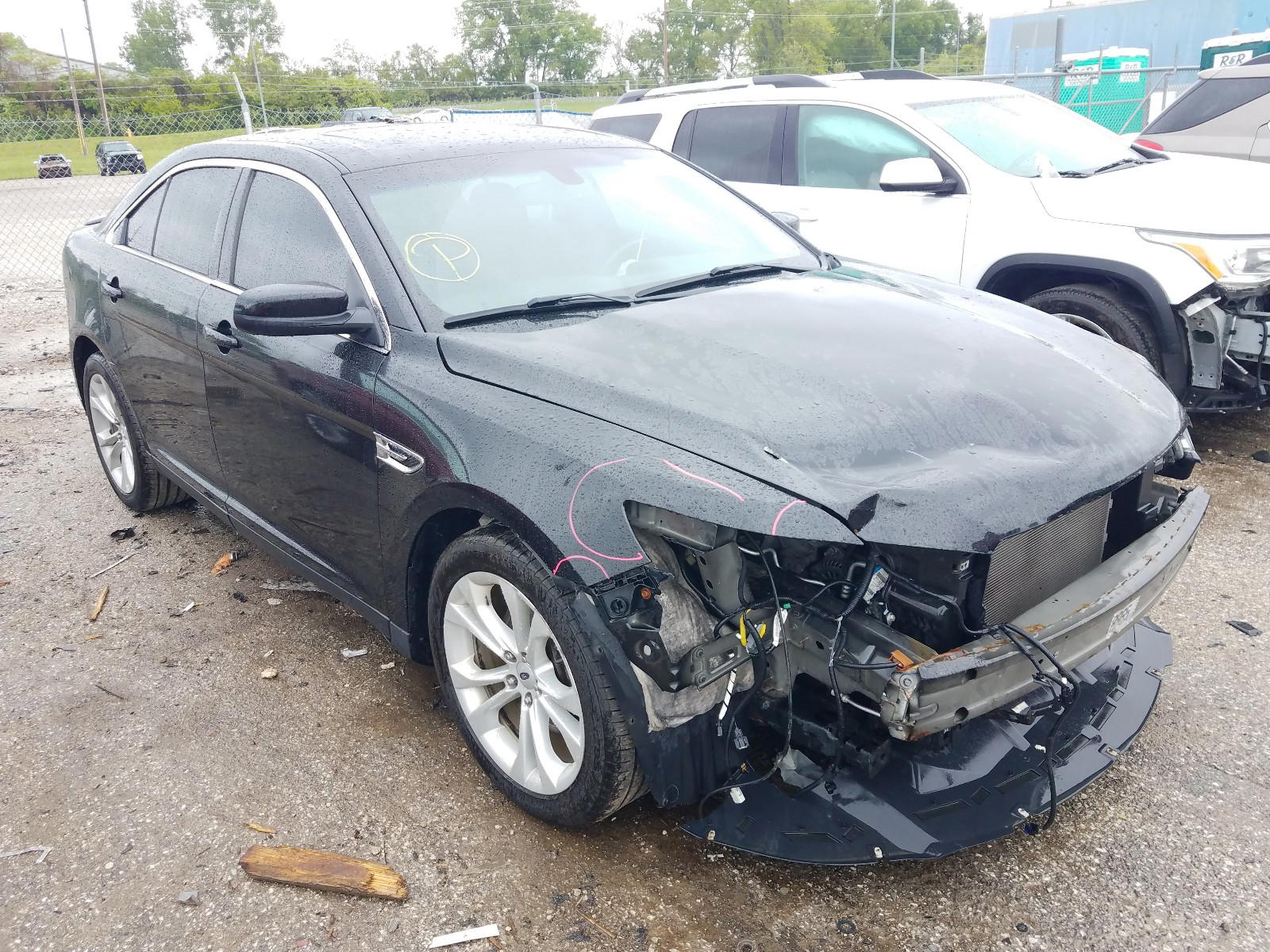 FORD TAURUS SEL 2013 with VIN 1FAHP2E83DG220762 - Photo from auction