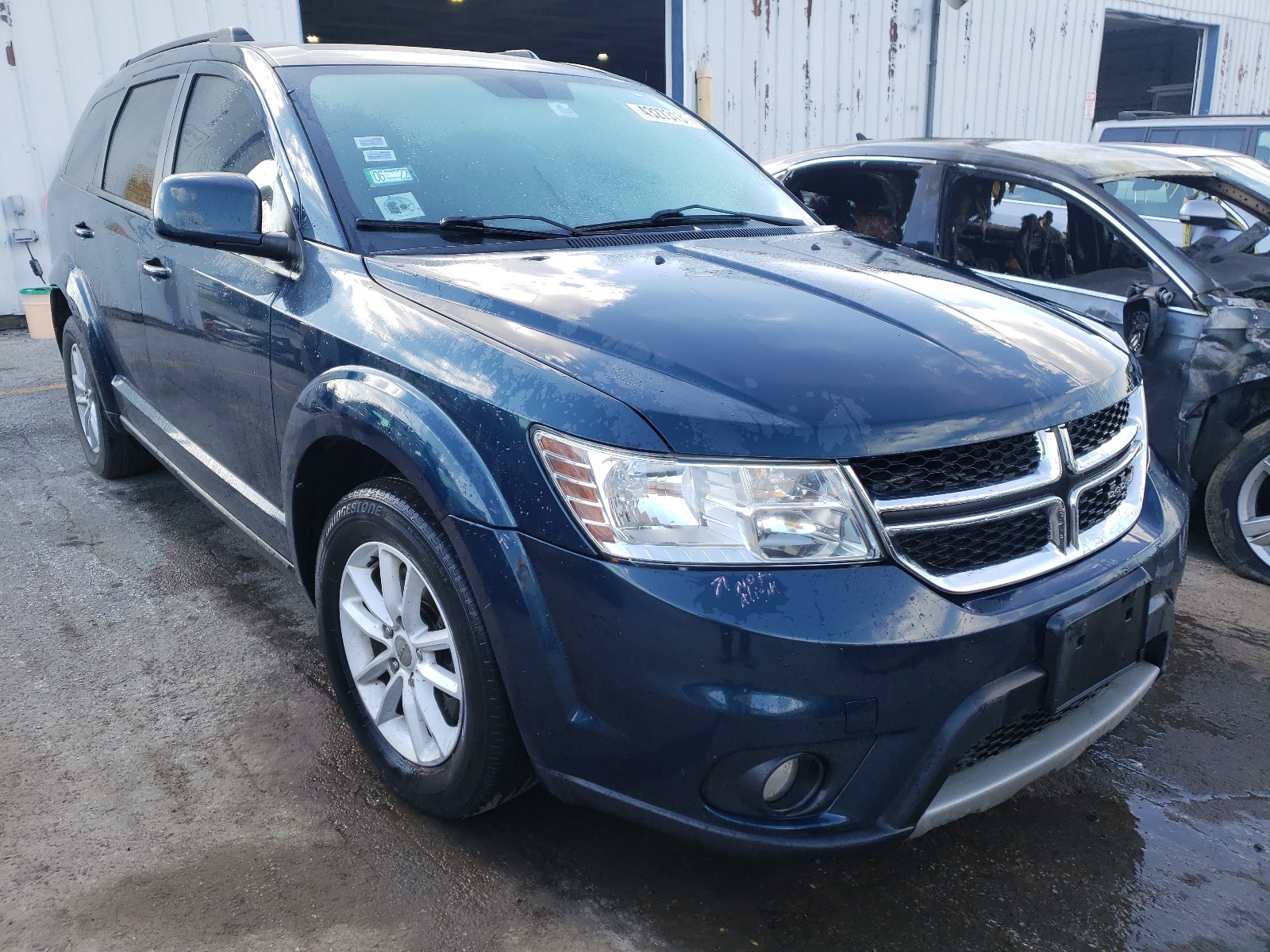 Photo 1 from auction – 2013 DODGE JOURNEY SX with VIN 3C4PDCBG9DT564799