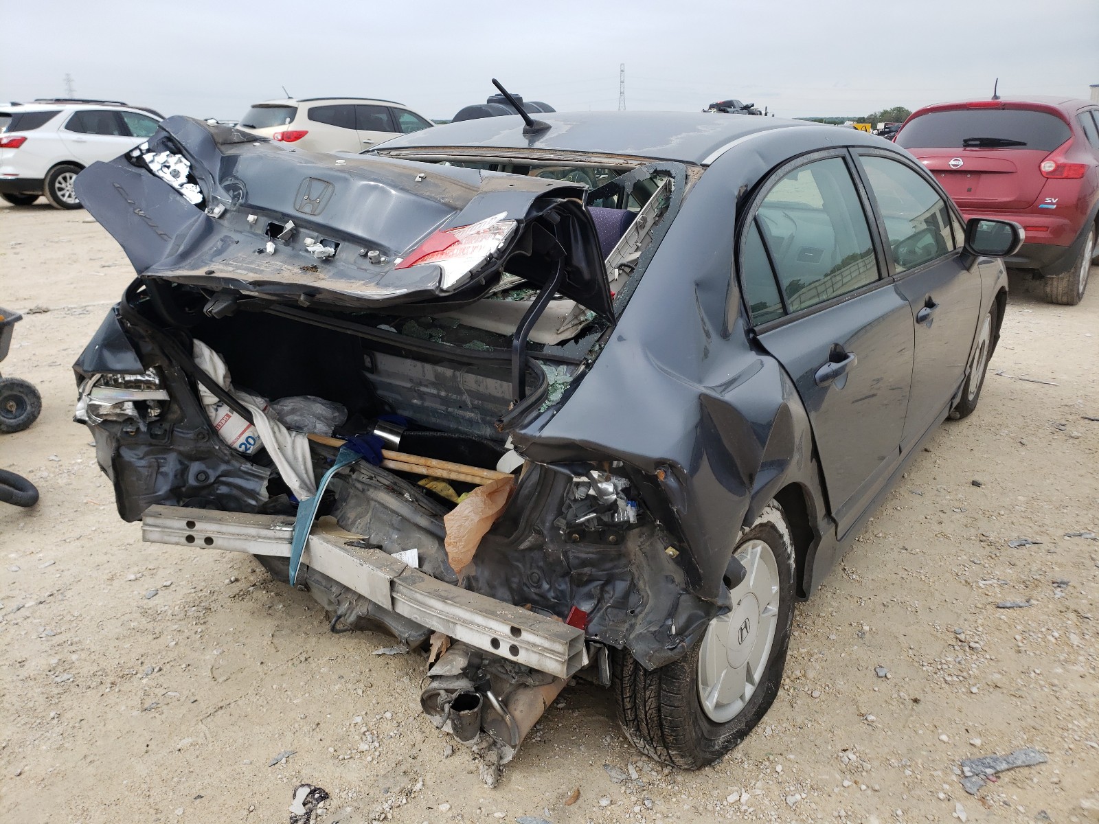 Photo 4 from auction – 2006 HONDA CIVIC HYBR with VIN JHMFA36226S009070