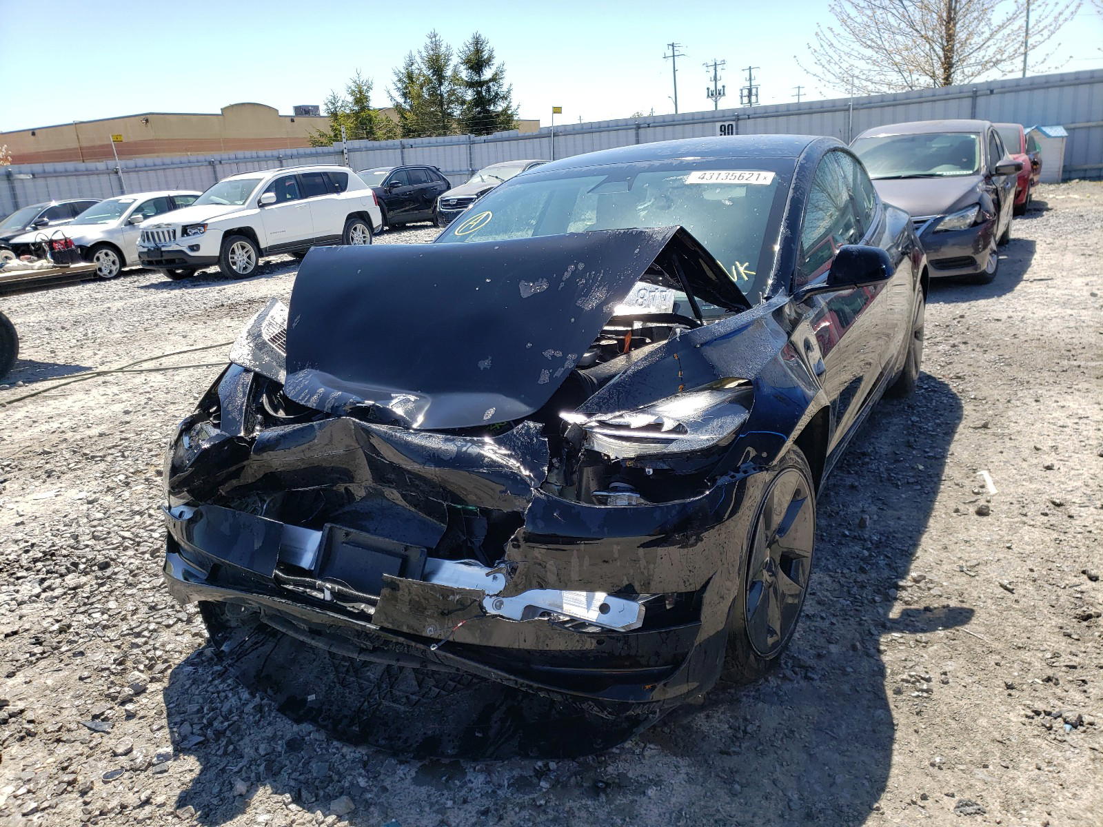 Photo 2 from auction – 2021 TESLA MODEL 3 with VIN 5YJ3E1EA5MF857430