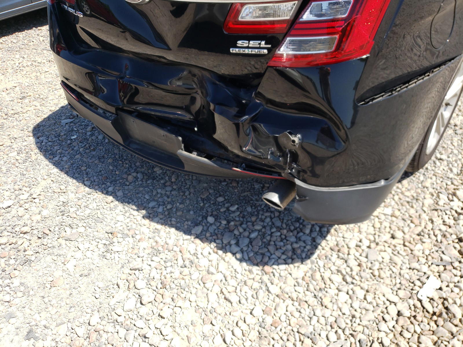 Photo 9 from auction – 2016 FORD TAURUS SEL with VIN 1FAHP2E89GG121089