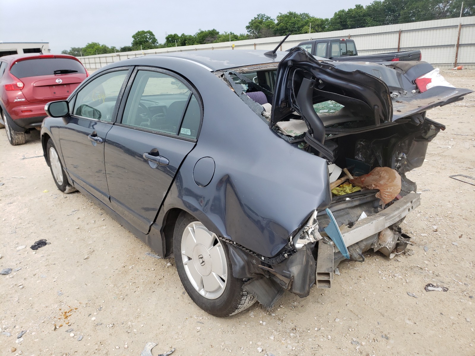 Photo 3 from auction – 2006 HONDA CIVIC HYBR with VIN JHMFA36226S009070