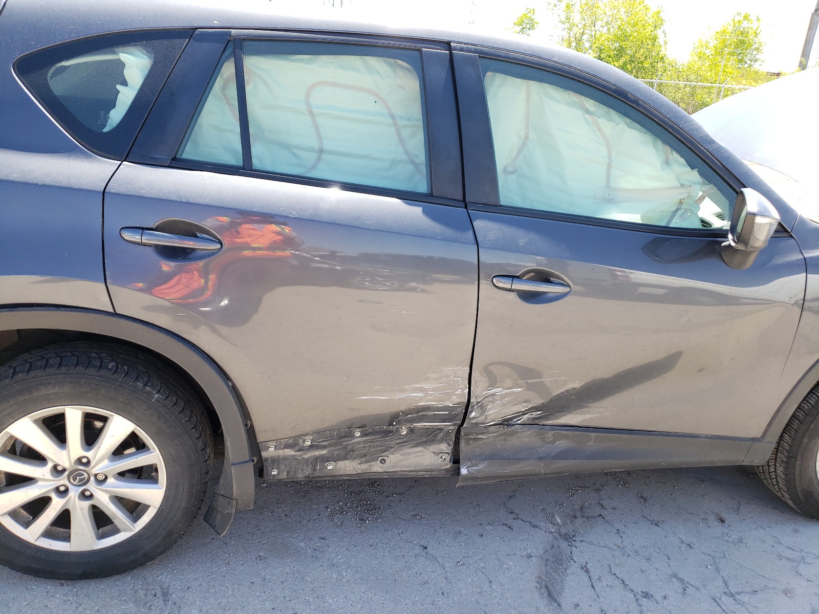 Photo 9 from auction – 2015 MAZDA CX-5 SPORT with VIN JM3KE2BE1F0544716