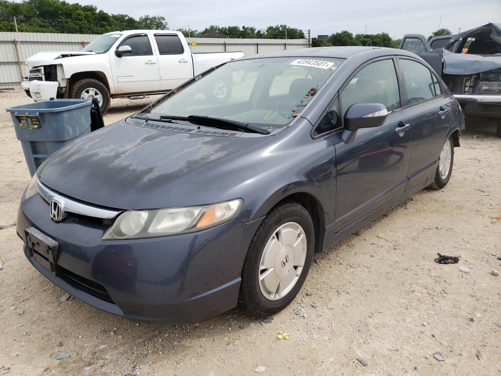 Photo 2 from auction – 2006 HONDA CIVIC HYBR with VIN JHMFA36226S009070