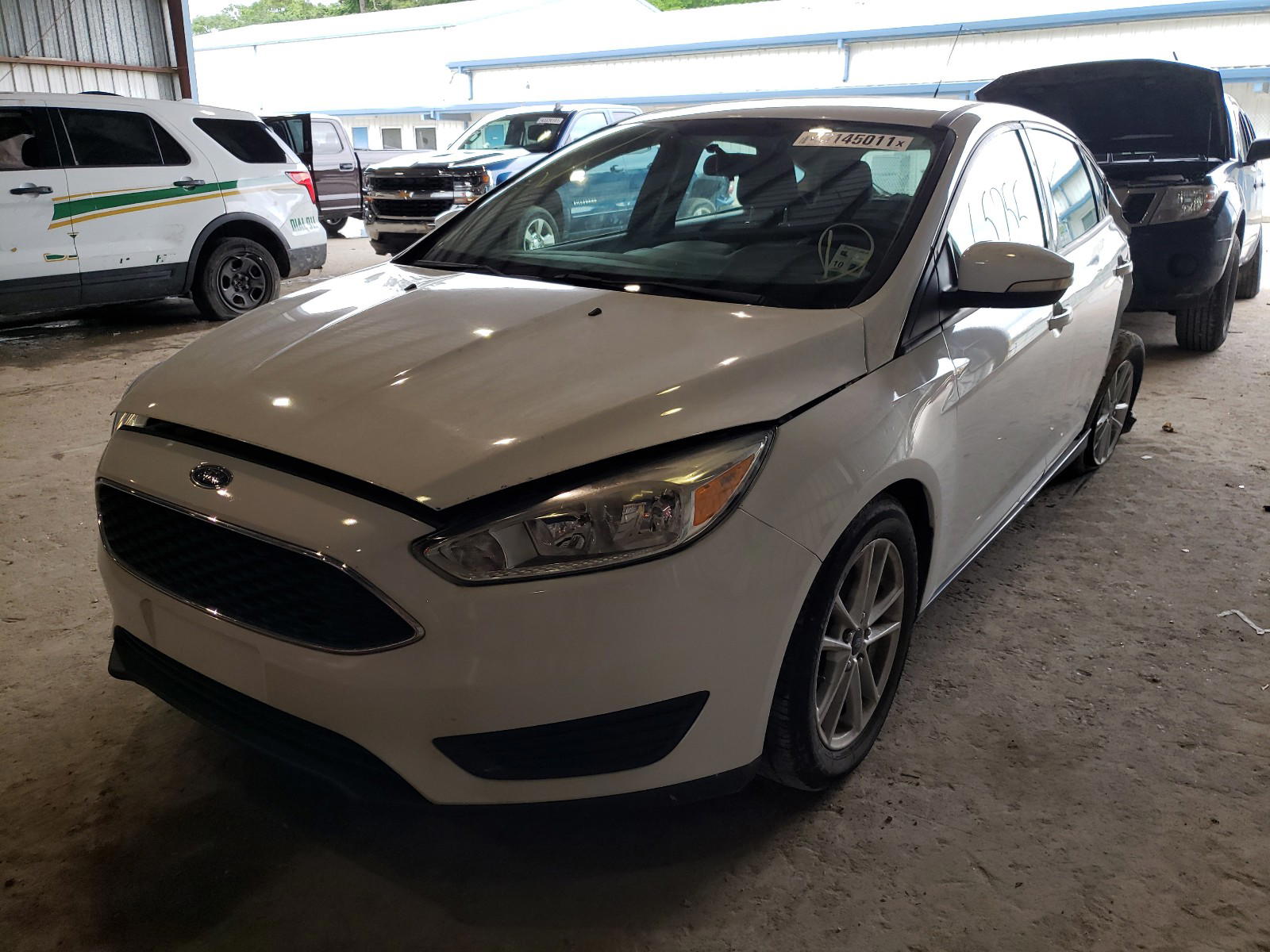 Photo 2 from auction – 2015 FORD FOCUS SE with VIN 1FADP3K24FL249394