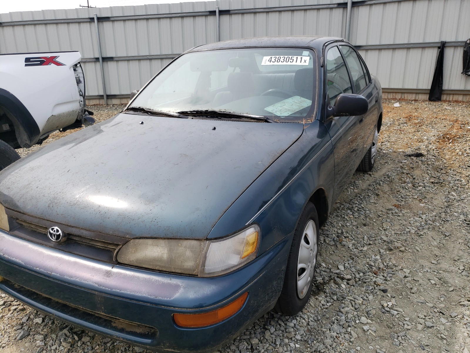 Photo 9 from auction – 1994 TOYOTA COROLLA with VIN 1NXAE04BXRZ153259