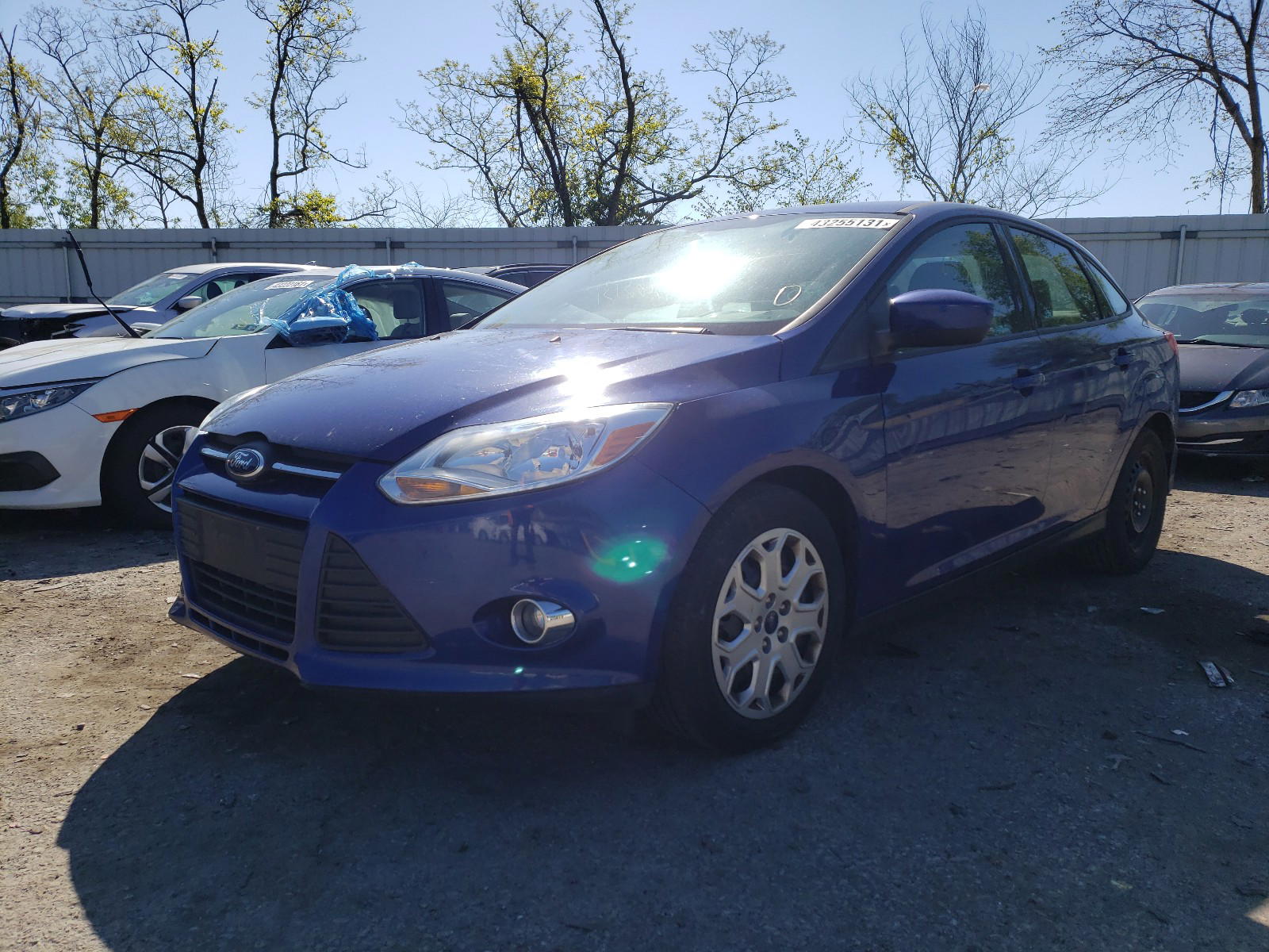 Photo 2 from auction – 2012 FORD FOCUS SE with VIN 1FAHP3F25CL462751
