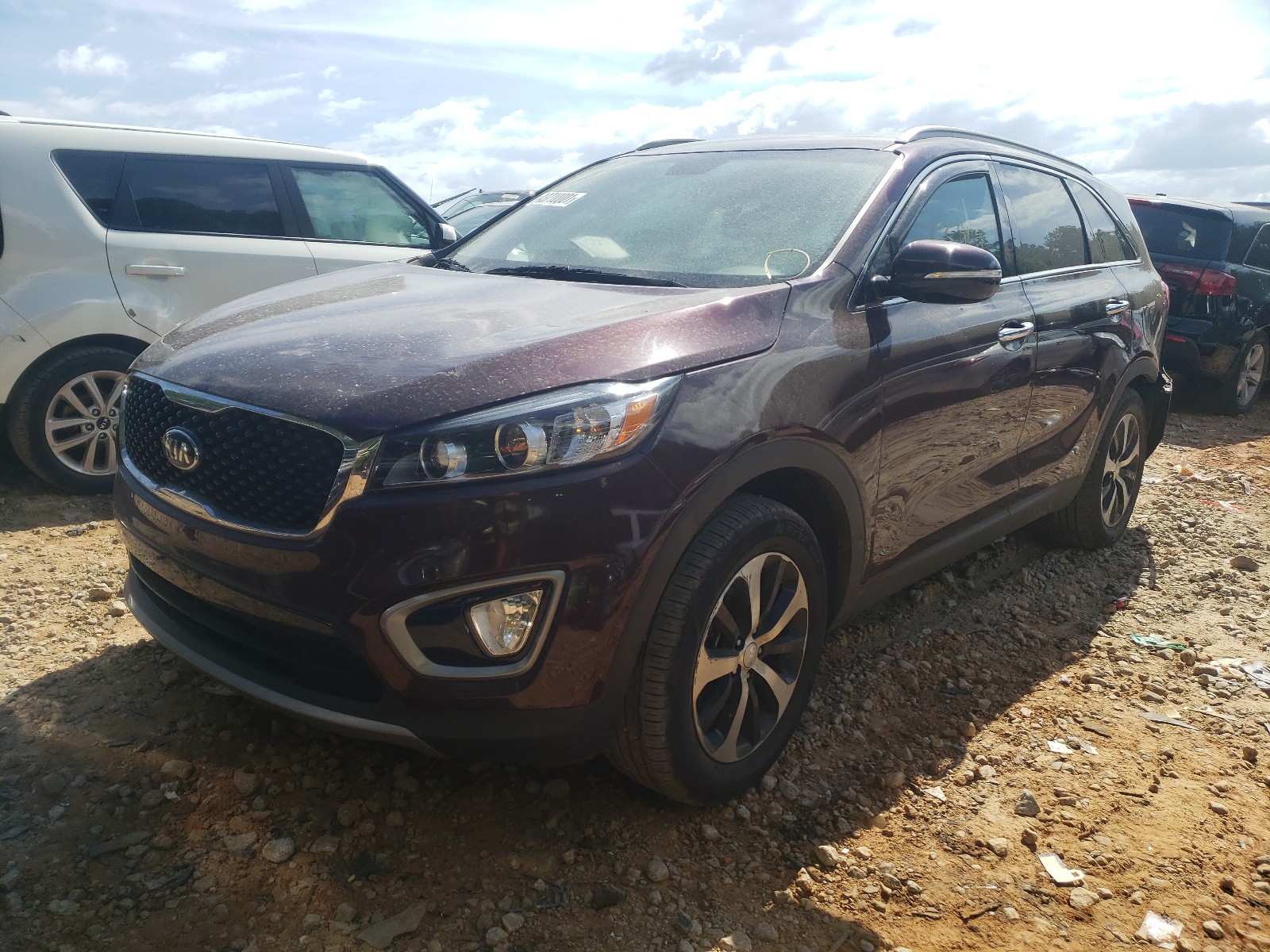 Photo 2 from auction – 2016 KIA SORENTO EX with VIN 5XYPH4A10GG155139