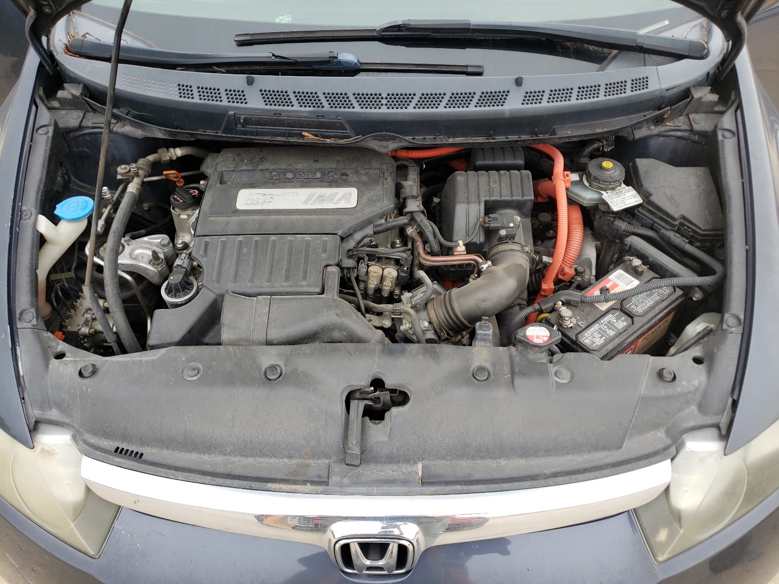 Photo 7 from auction – 2006 HONDA CIVIC HYBR with VIN JHMFA36226S009070