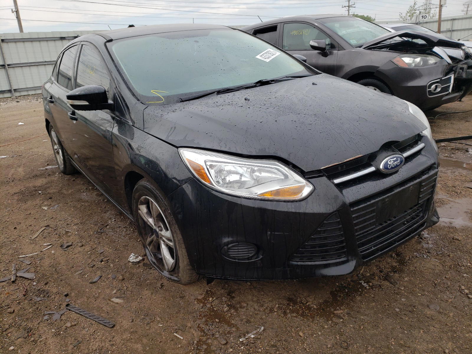 FORD FOCUS SE 2014 with VIN 1FADP3F25EL408304 - Photo from auction