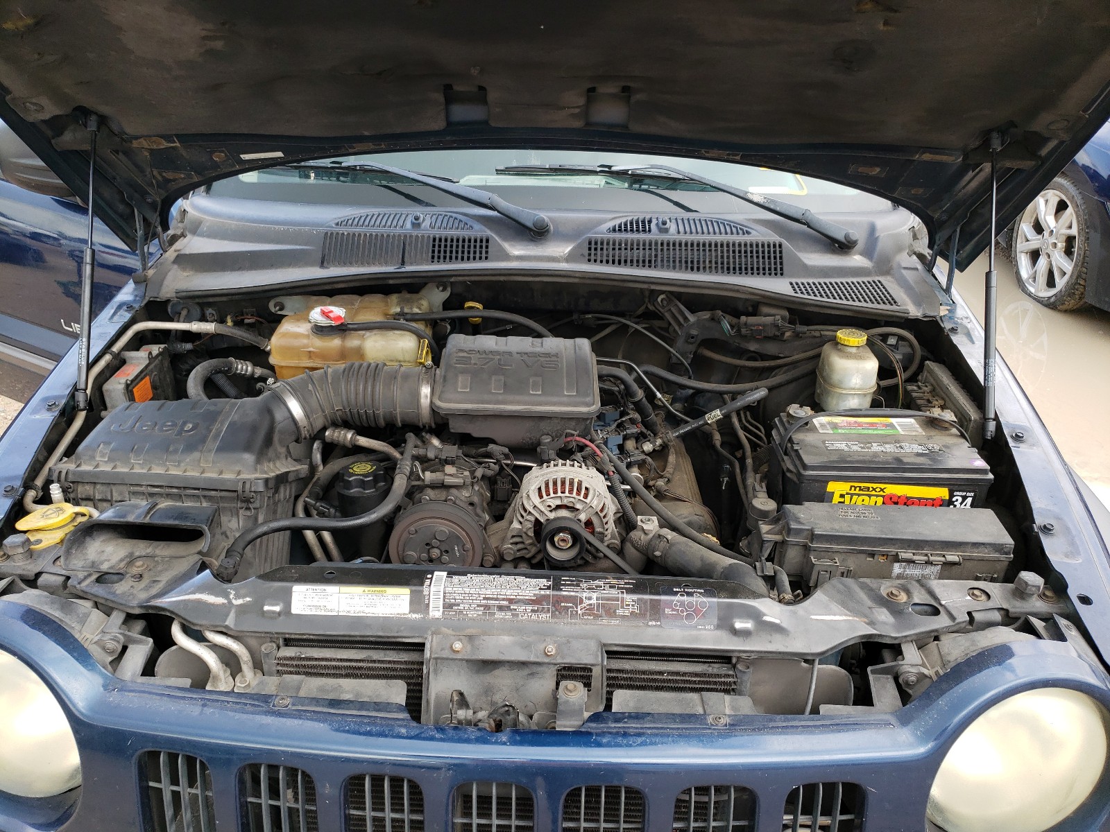 Photo 7 from auction – 2003 JEEP LIBERTY SP with VIN 1J4GK48K73W719666
