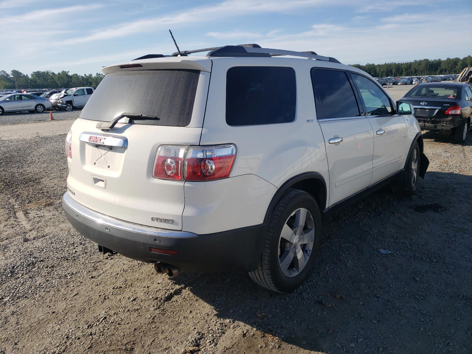 Photo 4 from auction – 2011 GMC ACADIA SLT with VIN 1GKKVSED7BJ401077