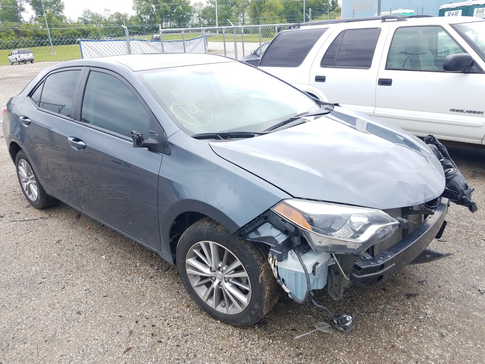 TOYOTA COROLLA L 2015 with VIN 5YFBURHE9FP234119 - Photo from auction