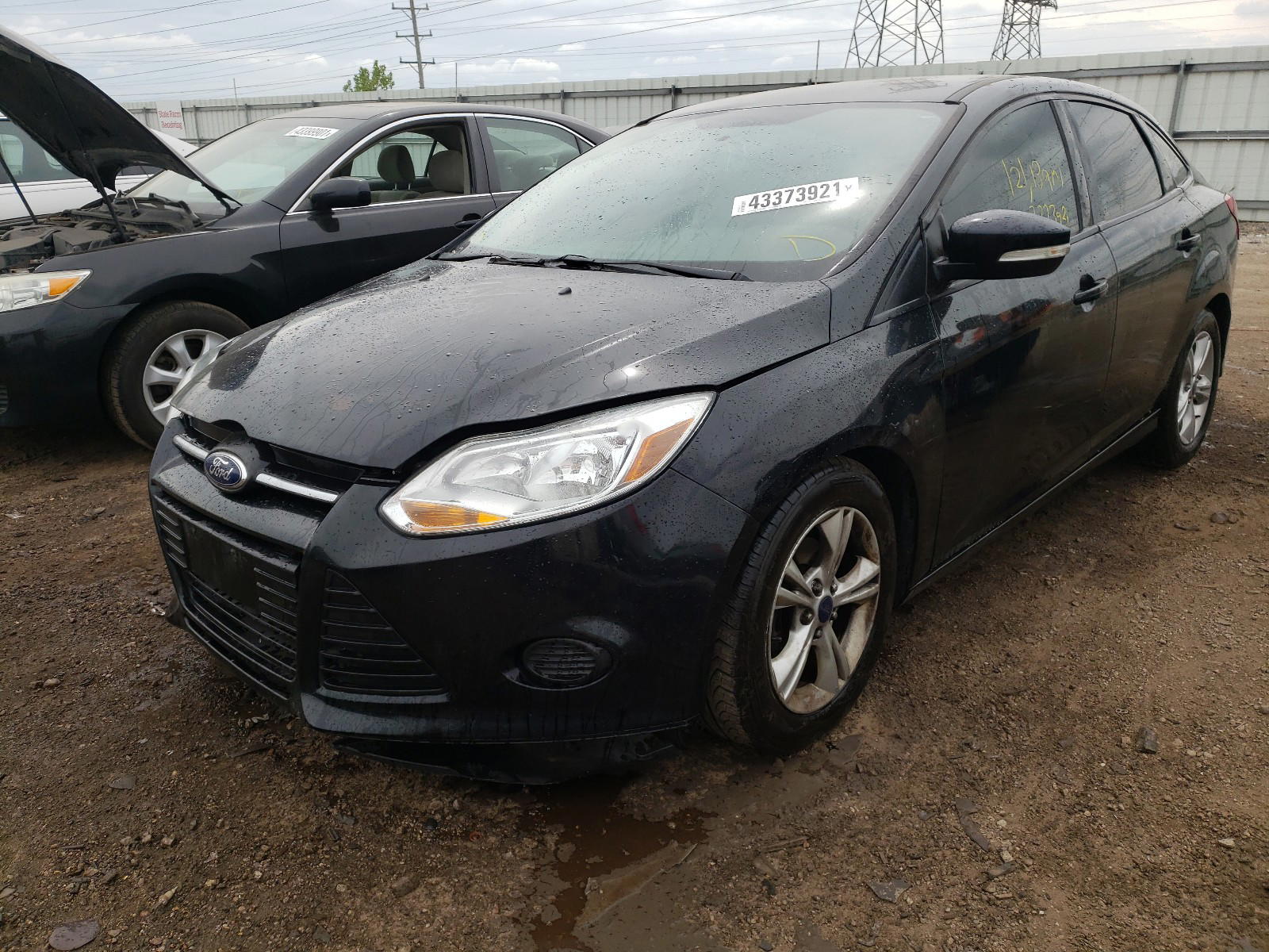 Photo 2 from auction – 2014 FORD FOCUS SE with VIN 1FADP3F25EL408304