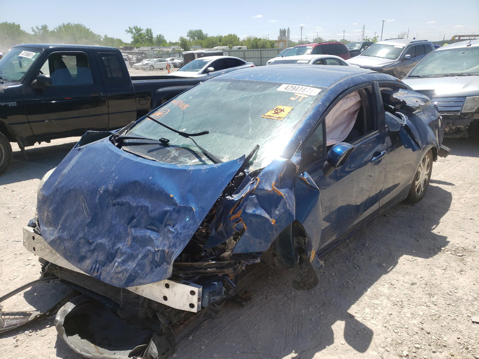 Photo 2 from auction – 2014 HONDA CIVIC LX with VIN 19XFB2F54EE024108