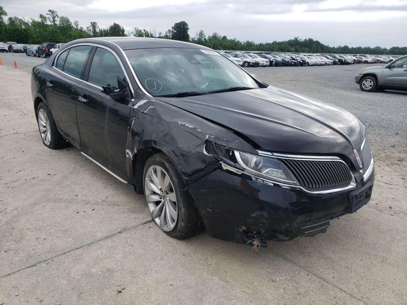LINCOLN MKS 2015 with VIN 1LNHL9DK9FG605706 - Photo from auction