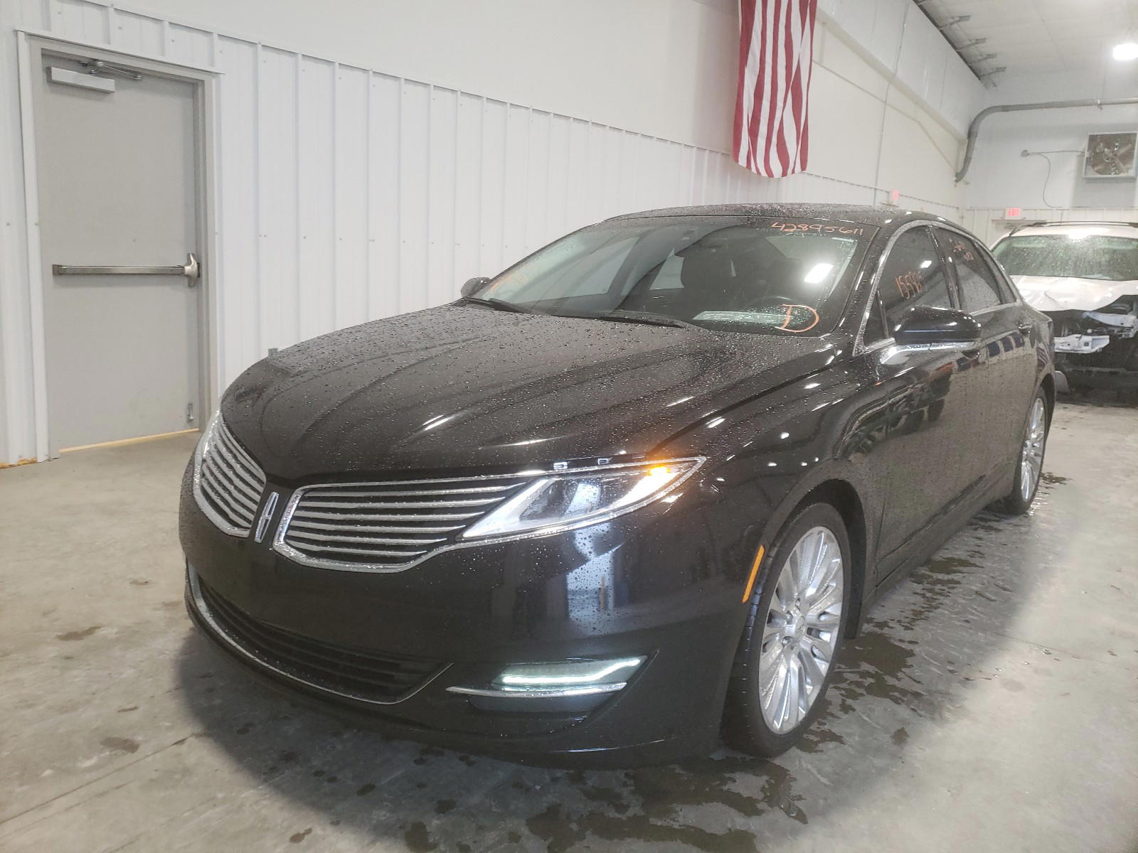 Photo 2 from auction – 2014 LINCOLN MKZ with VIN 3LN6L2G95ER826735
