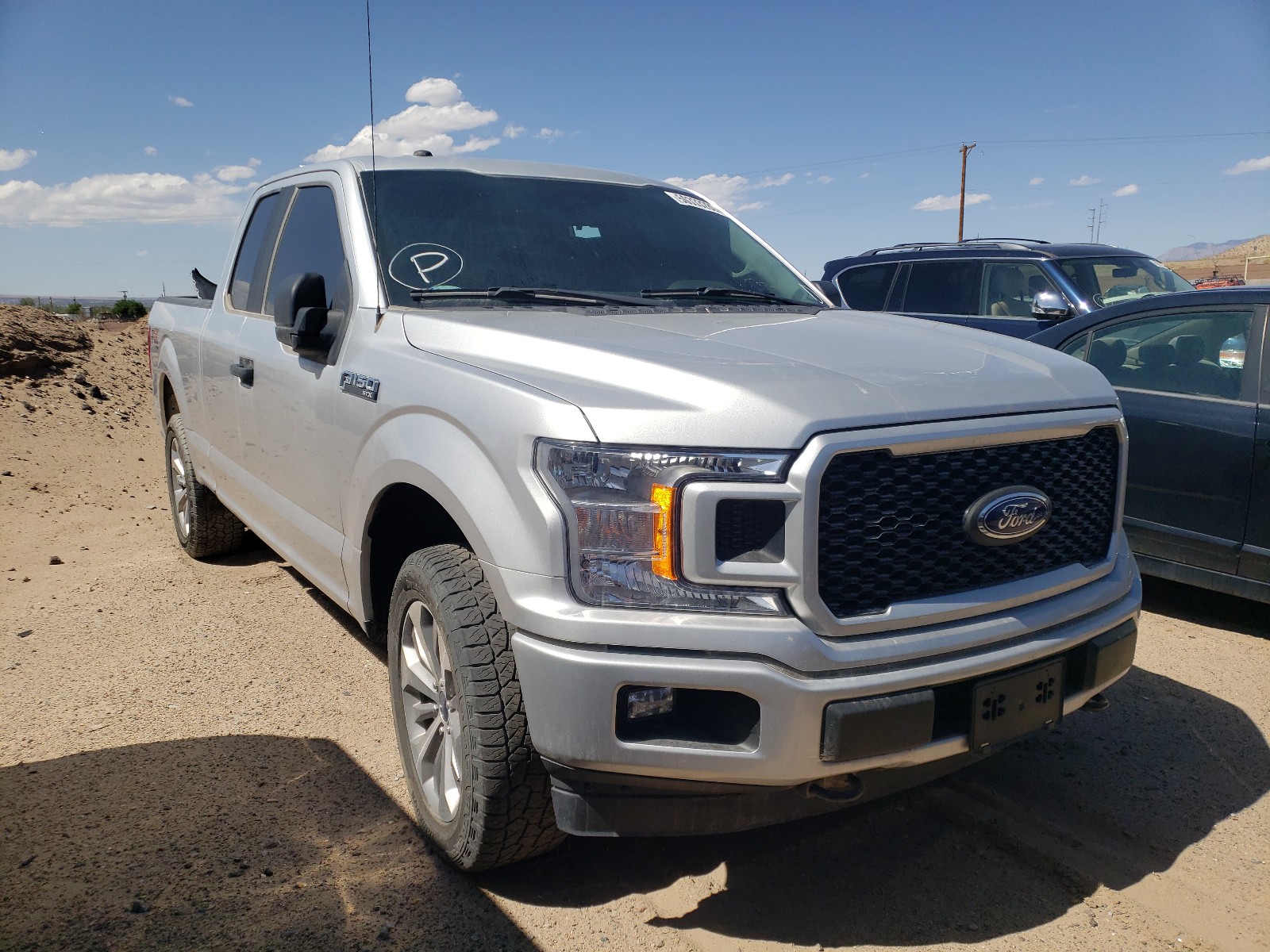 FORD F150 SUPER 2018 with VIN 1FTEX1EP6JKE38010 - Photo from auction