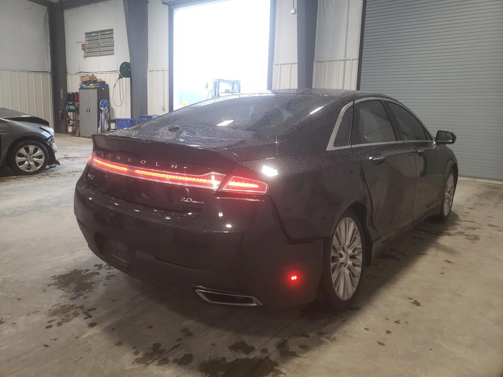Photo 4 from auction – 2014 LINCOLN MKZ with VIN 3LN6L2G95ER826735