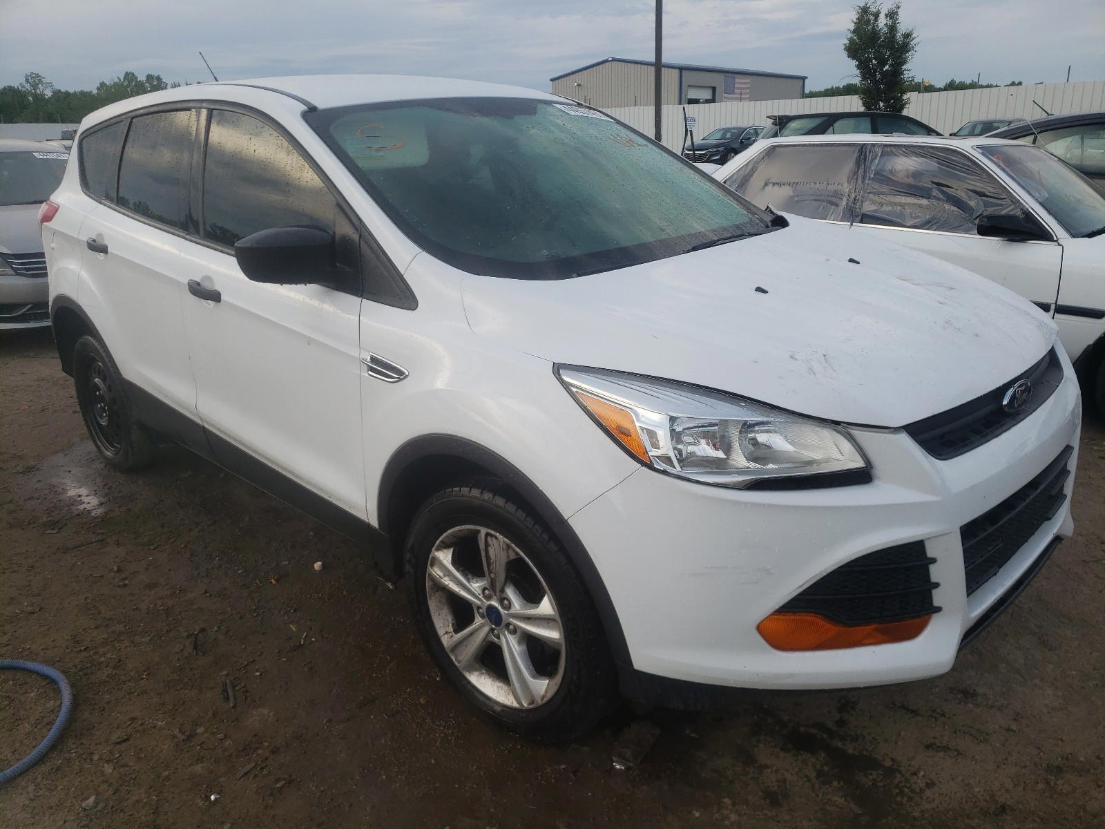 FORD ESCAPE S 2014 with VIN 1FMCU0F79EUE49730 - Photo from auction