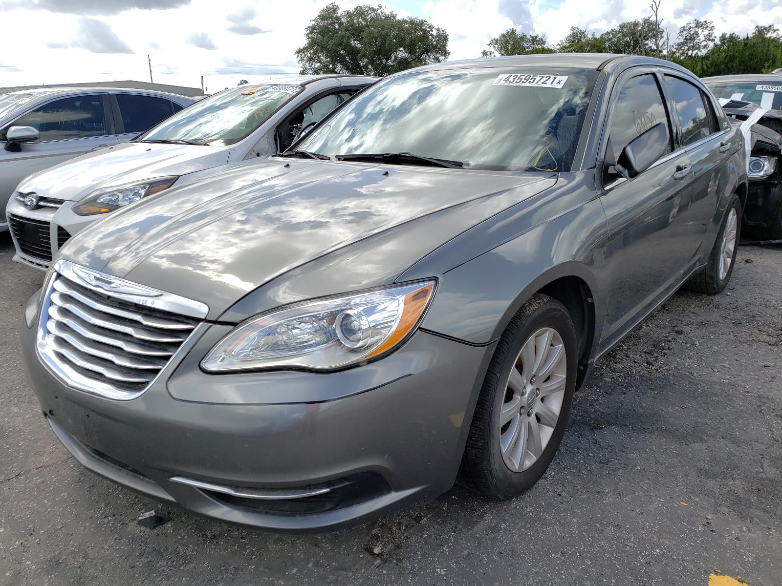 Photo 2 from auction – 2013 CHRYSLER 200 TOURIN with VIN 1C3CCBBB7DN631744