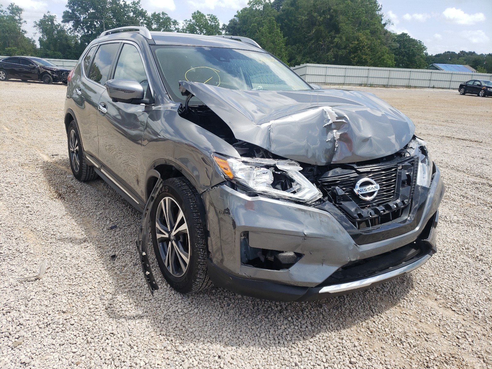 NISSAN ROGUE 2017 with VIN JN8AT2MT3HW390374 - Photo from auction