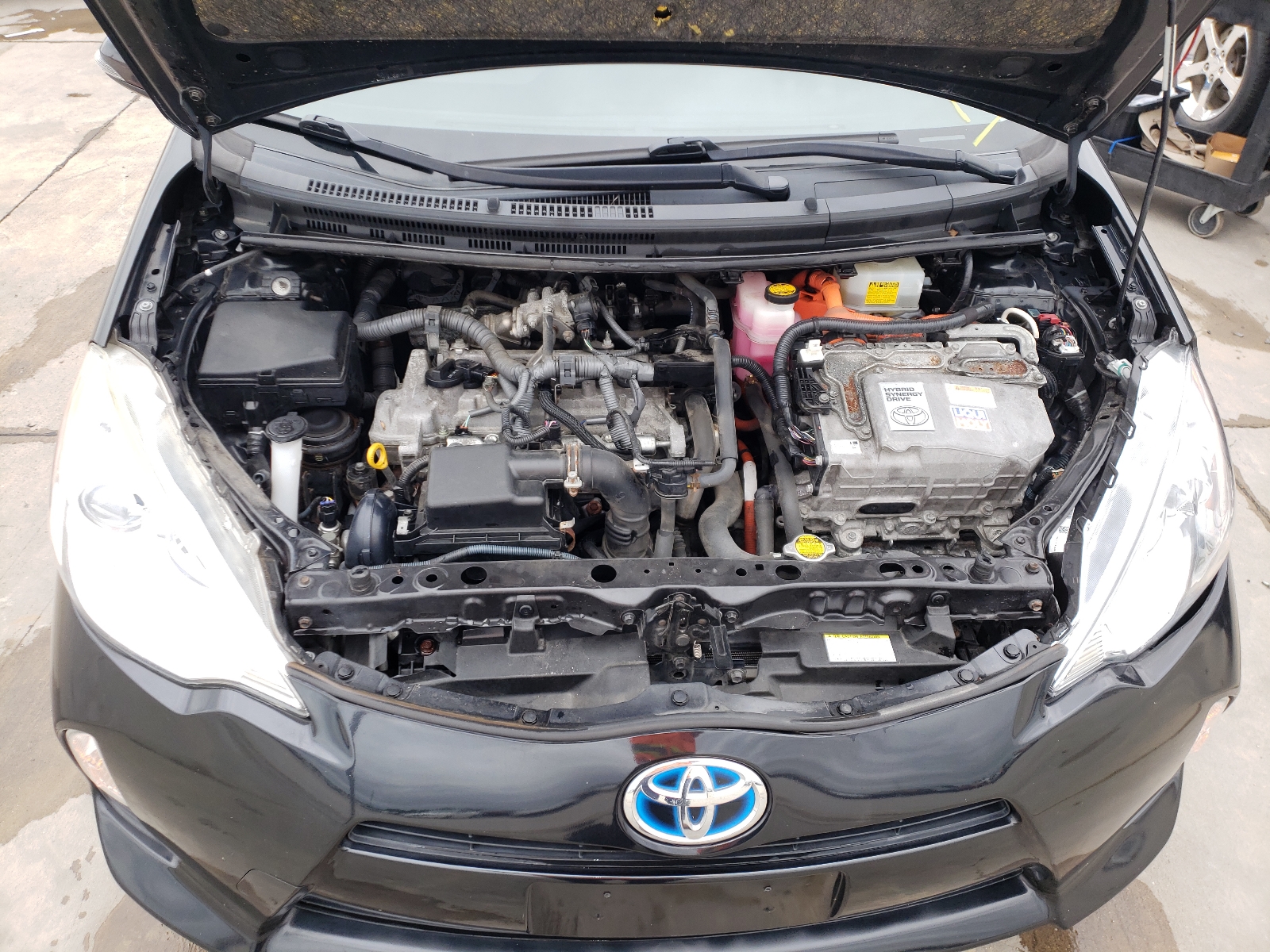 Photo 7 from auction – 2014 TOYOTA PRIUS C with VIN JTDKDTB35E1575217